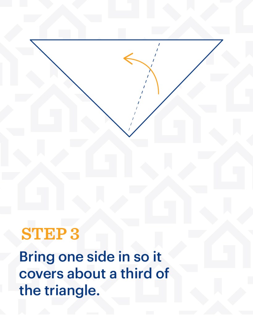 Snowflake Cutout Step 3: Bring one side in so it covers about a third of the triangle.