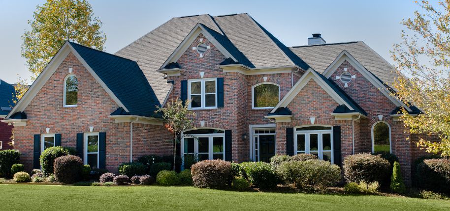 Beautifully designed brick home representing Great Day Improvements’ professional home remodeling craftsmanship for homeowners around Chapin.