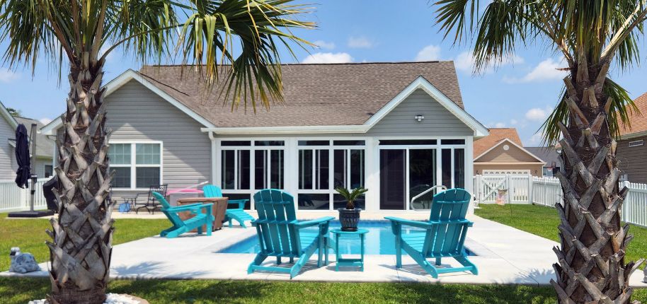 Inviting backyard and sunroom addition by Great Day Improvements, illustrating expert home renovation services available near Gaston.