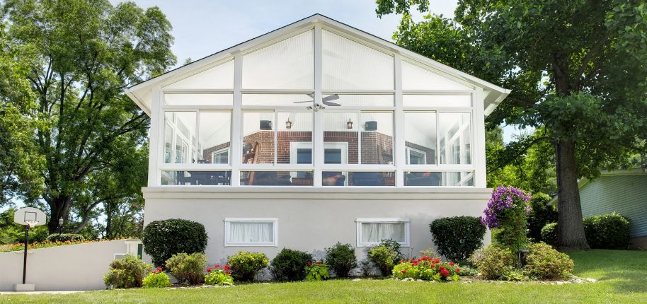 Bright and airy sunroom addition by Great Day Improvements, demonstrating expert home renovation craftsmanship in the Highland Park area.