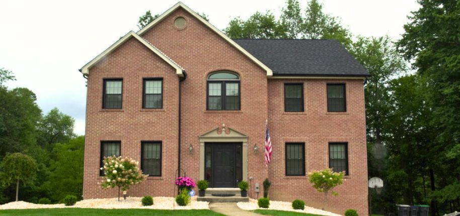 Stunning home renovation in Lannon by Great Day Improvements featuring custom brickwork and new energy-efficient windows.