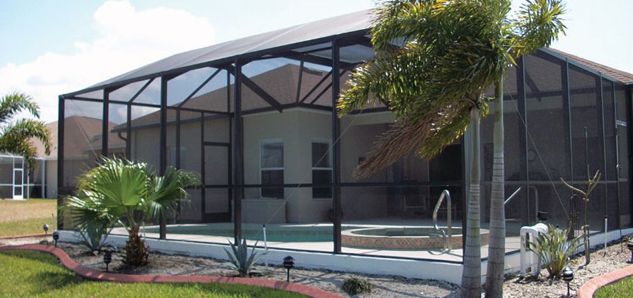 Durable screened pool cage from Great Day Improvements in Largo, FL, ideal for keeping out pests while enhancing backyard usability and comfort.