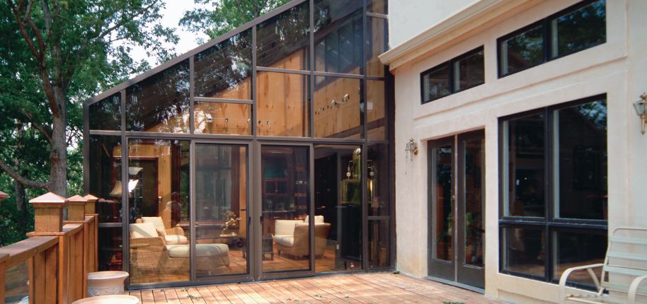 Stylish glass and stucco home highlighting Great Day Improvements’ precision home renovation services in Saint Hedwig, Texas.