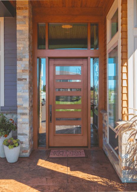 Light brown wood entry door with horizontal glass cutouts.