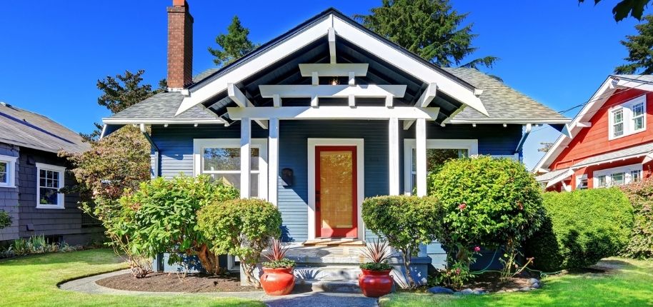 Charming bungalow with refreshed siding, custom trim, and a welcoming front porch, remodeled by Great Day Improvements to preserve character while improving performance.